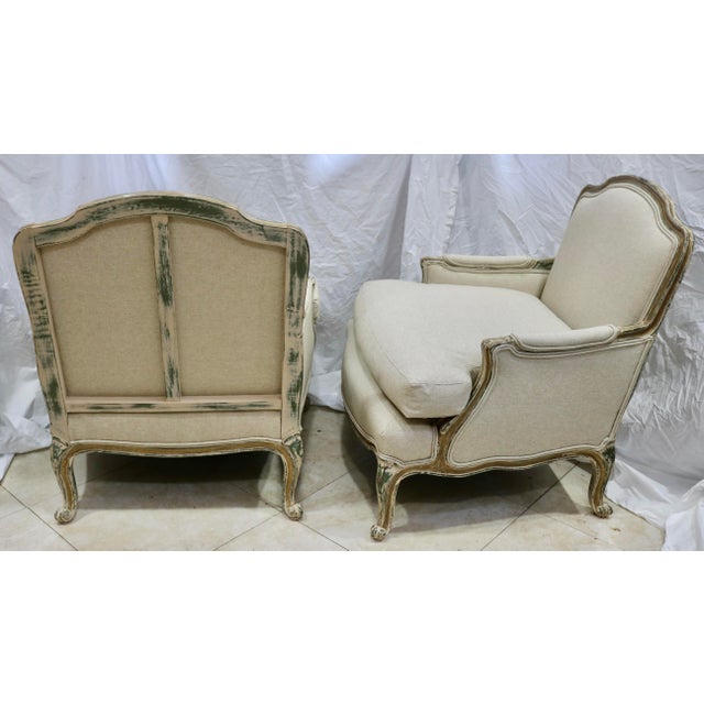 French Louis XV Bergere Chairs Attributed to Baker Furniture Re-Upholstered in Belgian Natural Linen -a Pair. There is no...