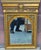 A late 20th century Hollywood Regency Italian Versace Style Gilded Medusa Figural Wall Mirror. Dimensions: 26.5" in width,...