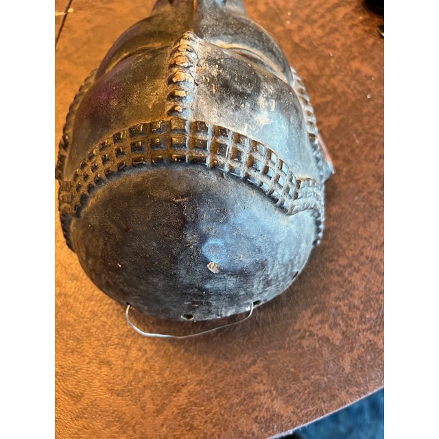 Stunning vintage hand-carved wooden African mask, likely originating from the Baule (Côte d'Ivoire) or Dan/Gere (Liberia)...