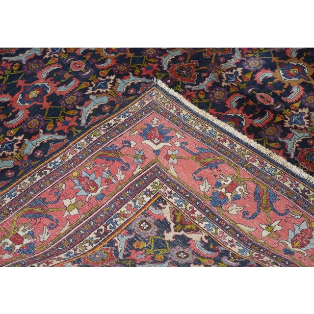 This incredibly compact and solid Kurdish town weaving pairs of rose palmettes, with jagged curled leaves and “turtle”...