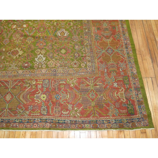 An early 20th Century Green Sultnabad room size rug