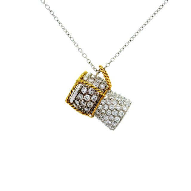 A contemporary pendant necklace by Roberto Coin crafted in Vicenza, Italy, the "City of Gold", showcasing a unique drum...