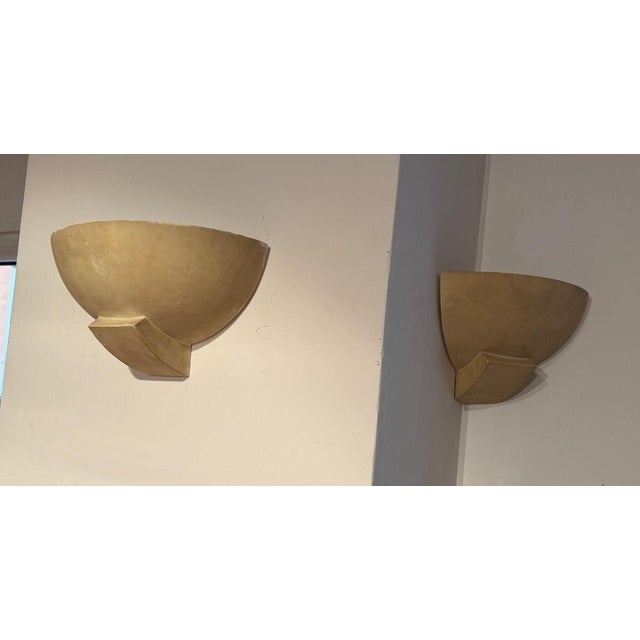 Suite of 3 art deco wall lights or wall sconces in off-white colored originally patinated plaster, from france, circa...