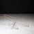 ABOUT A kinetic balance sculpture crafted from finely brazed copper finish or brass wire, this tabletop art piece depicts...