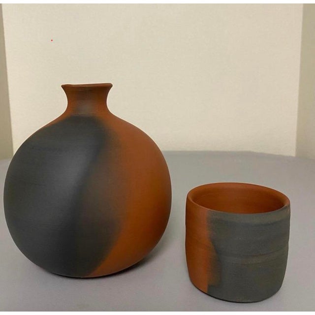 Beautiful Sake Bottle and cup. Sekisui V (born 1941 - ) is a 14th generation ceramic potter, is recognized for his work in...