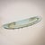 Wall-mounted coat rack model 2185 featuring an oval shelf of blue-tinted glass. The brass mounting incorporates sliding...