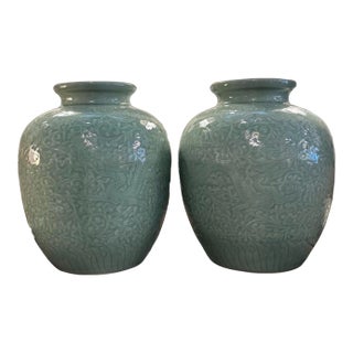 Pair of Early 19th Century Chinese Green Celadon Pots With Dragon, Ruyi, and Wave Motifs For Sale
