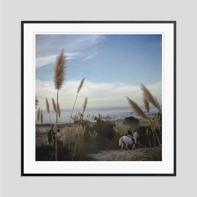 Pebble Beach' by Slim Aarons Open Edition Riders from the Pebble Beach Equestrian Center wend their way through the...