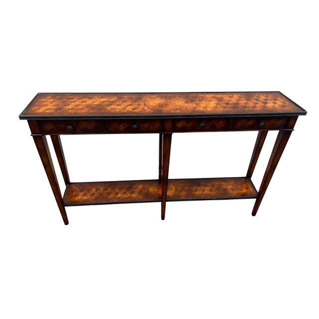 Console table with brass trim and Parquet work which is Wonderfully done. Great quality accent piece to add beauty to your...