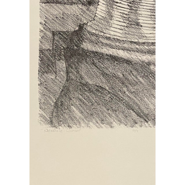 "Ndebele Woman" lithograph on paper, pencil signed illegibly, titled and numbered 6 of 9. Combinedshipping avail;able,...