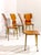 Four chairs with curved plywood frames, brass supports, and details. Backrests and seats in curved plywood veneer and...