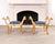 A whimsical pair of Mid-Century Giltwood Italian Curule stool benches crafted in the Neoclassical-Empire taste. The stools...