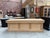 This former large display counter has been completely restored. It features a beautiful oak top and a fir wood frame. On...