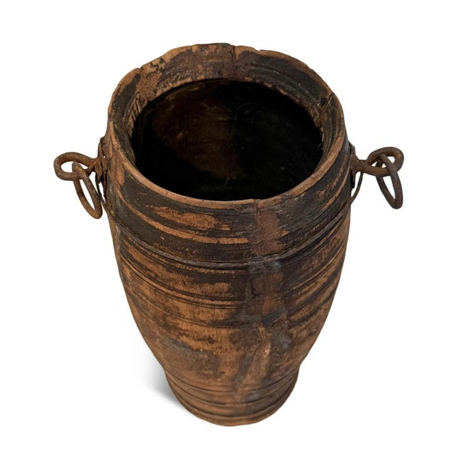 Vintage wooden pot with iron ring handles originally used for carrying water. Wonderful piece with authentic signs of age...
