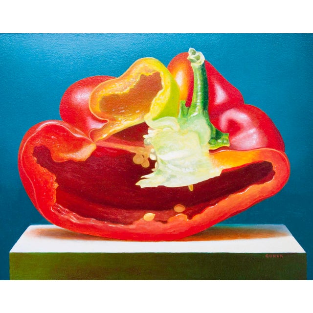This oil on board painting showcases a vibrant red bell pepper, sliced open to reveal its inner texture and colors,...