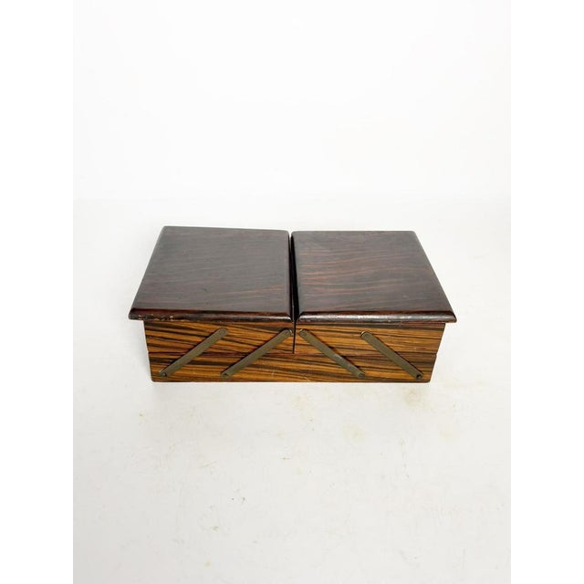 Wooden box with integrated mirror, made in France circa 1950. This elegant box features a metal hinged, expandable...