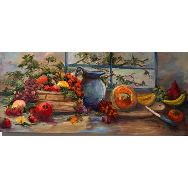 This is a beautifully painted still life depicting a bounty of luscious fruits surrounding a stunning blue pitcher. It is...