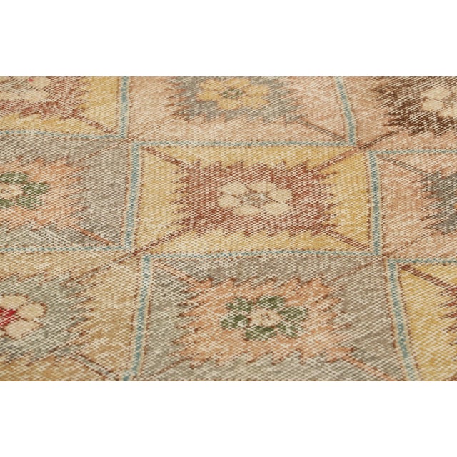 Made with hand-knotted wool in Turkey circa 1960-1970, this 3x7 vintage runner rug is an exciting new addition to Rug &...