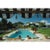 Poolside in Sotogrande 1975 Bathers round a pool in Sotogrande, Spain, August 1975. Photo by Slim Aarons Slim Aarons was...