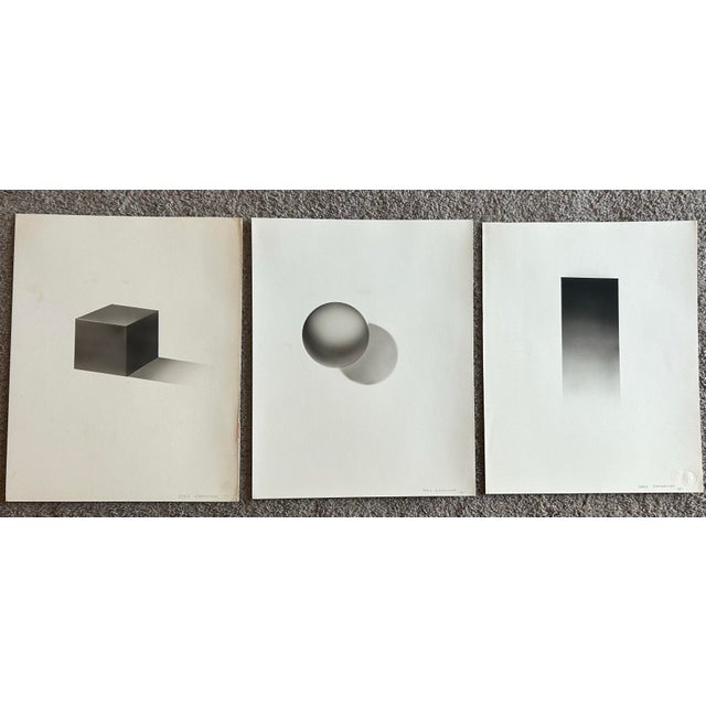 Set of three abstract, gray, monochromatic airbrush paintings. Done on high quality parchment paper, unframed. Each...