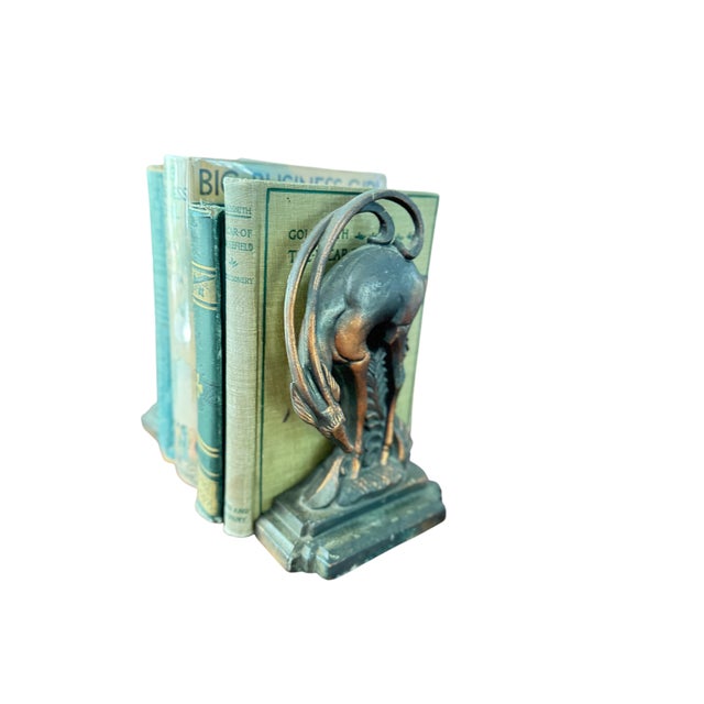 Single rt deco gazelle bookend from the 1930s, manufactured by Crescent Metal Works, New Jersey. Spelter with copper...