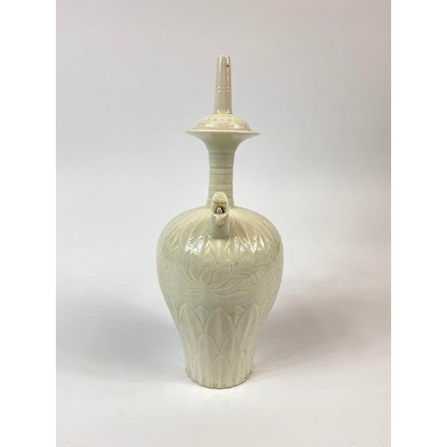 1960's Song Dynasty style Cream white wine pot with a little hydra (water dragon) as the spout. There is no lid.