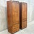 A beautiful pair of tall cabinets in the campaign style. Walnut veneers with brass mounts and hardware. Made by...
