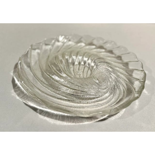 Perfect for a Coastal interior or clam bake parties, this vintage Nautilus shell shape serving dish has an indentation in...