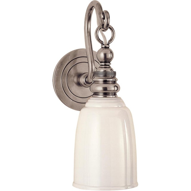 Boston Loop Arm Sconce in Antique Nickel with White Glass Designer: Chapman & Myers Height: 12.5" Extension: 7.5"...