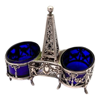 Salt and Pepper Shakers with Silver Structure For Sale