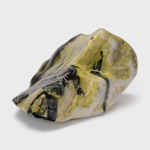 A well-chosen stone is a focal point of both a traditional Chinese garden and a scholar's studio - evoking the...