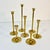 Thus is a lovely set of 7 Brass taper candle holders from the Mid-Century. They graduate down in size from 9” to 3” tall....