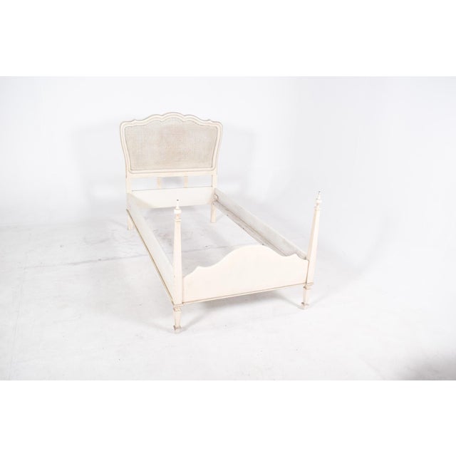 This charming single bed is crafted from solid wood and finished in a soft white paint, giving it a delicate and timeless...