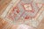 An early 20th Century Geometric Persian Malayer in red, blue and cream Measures: 3'6'' x 6'5''.