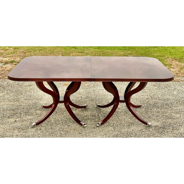 Magnificent best describes this mahogany double pedestal dining table. The table was designed by renowned designer Michael...