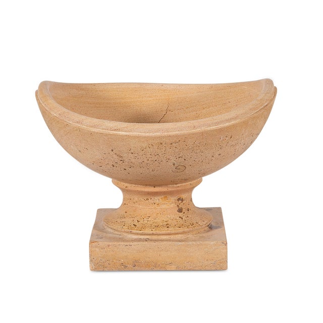 Graceful and architectural, the crescent vase reinterprets an ancient form with sculptural balance. Its sweeping, upturned...