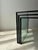 Set of three postmodernist nesting tables, glass and black metal, 1980s. Some designs are built on form, others on...