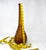 Add a glow of Mid-Century Italian sophistication to your shelving or tablescape with this stunning Empoli amber glass...