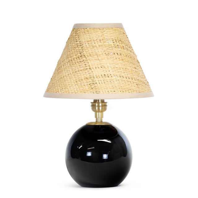 Compact yet striking, the Giorgio Mini Table Lamp is anchored by hand-blown black glass. Designed for versatility, it...