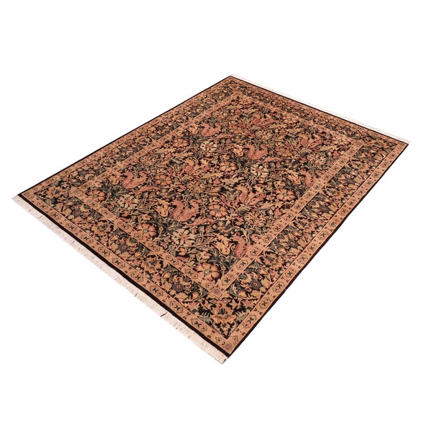 Designed with mesmerizing intricacy and gorgeous color palette, this hand-knotted masterpiece demonstrates the beauty and...