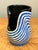 This vintage abstract studio pottery vase is a bold expression of mid-century artistic experimentation, showcasing a...
