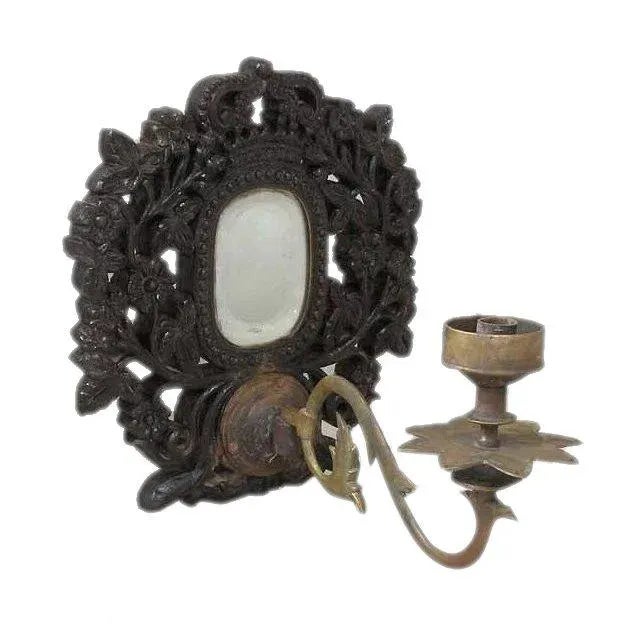 DETAILS This interesting, single, antique candle sconce was found in Goa. The teak back is elaborately hand carved and...