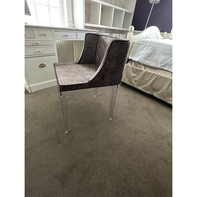 Leopard Print Accent Chair with Acrylic Legs and Purple Piping Add a bold, fashion-forward statement to your space with...