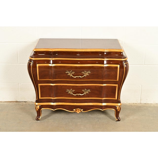 A beautiful French Provincial Louis XV or French Rococo style bombay form chest of drawers, commode, or bedside chest By...