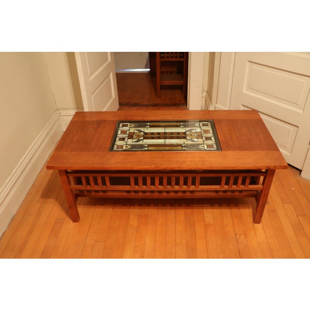 I purchased this wood (I believe oak but not sure what species) coffee table for my arts and crafts-styled living room...