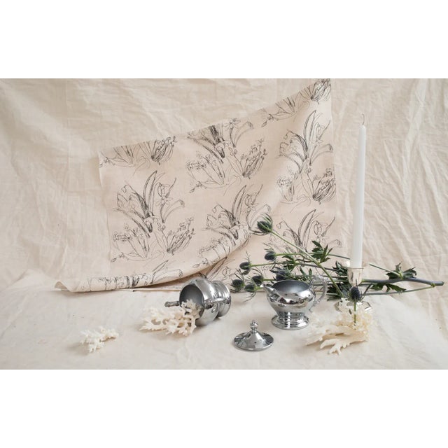The Stevie Howell Blueprint Flower Fabric is printed on 100% Belgian Linen. Each yard is printed in the US with water-...