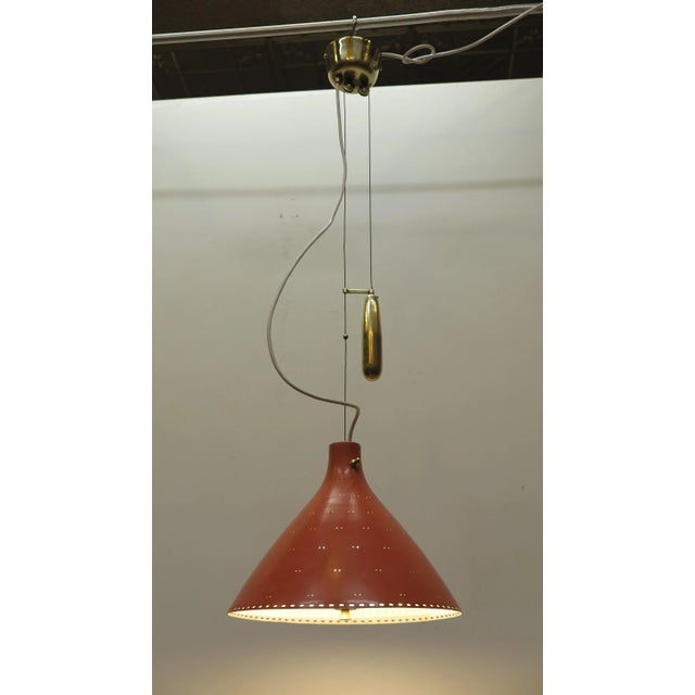 Paavo Tynell counter balance pendant lamp. Early counter balance pendant light by Paavo Tynell model A1942. Having brass...