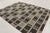 Handwoven in wool, this 8x10 Scandinavian rug features a rhythmic geometric design in warm brown, ivory, charcoal, and...