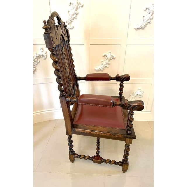 Large antique victorian quality carved oak armchair having a wonderful quality carved oak top with carved oak leaves,...