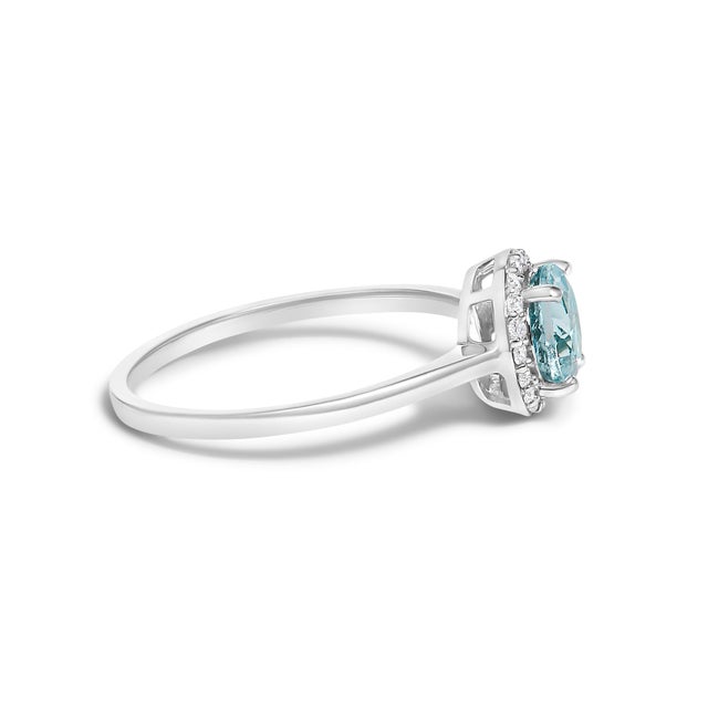 Adorn your hand with the splendor of rich, velvety blue captured in a mesmerizing 6x6 mm aquamarine, its fiery hues...